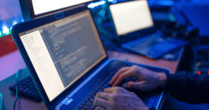programmer hands laptop keyboard computer technology it manager his workplace professional coding encryption network security 1